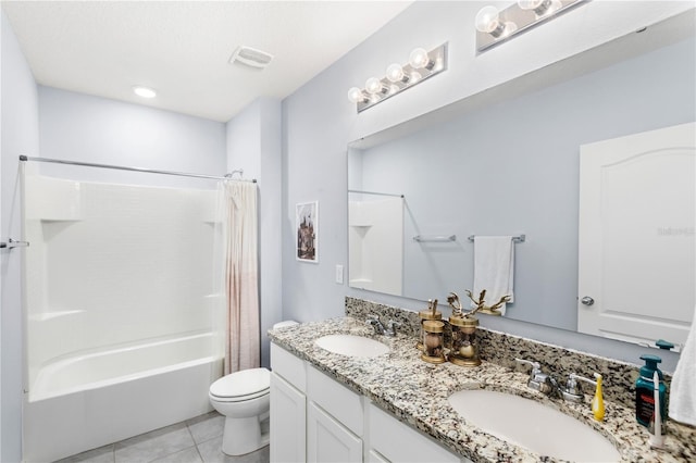 9024 Alba Ln, Kissimmee, FL 34747 - full bath with tile patterned floors, double vanity, and shower / tub combo