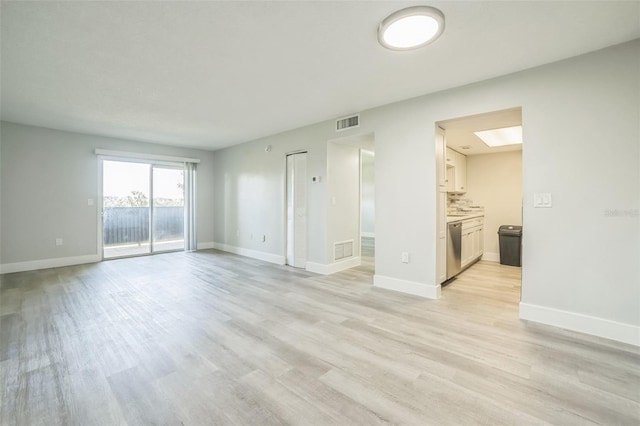 936 Lake Destiny Rd Unit G, Altamonte Springs, FL 32714 - spare room with light wood-type flooring and baseboards