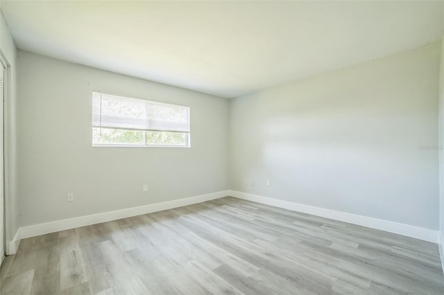 936 Lake Destiny Rd Unit G, Altamonte Springs, FL 32714 - empty room featuring light wood-style floors and baseboards