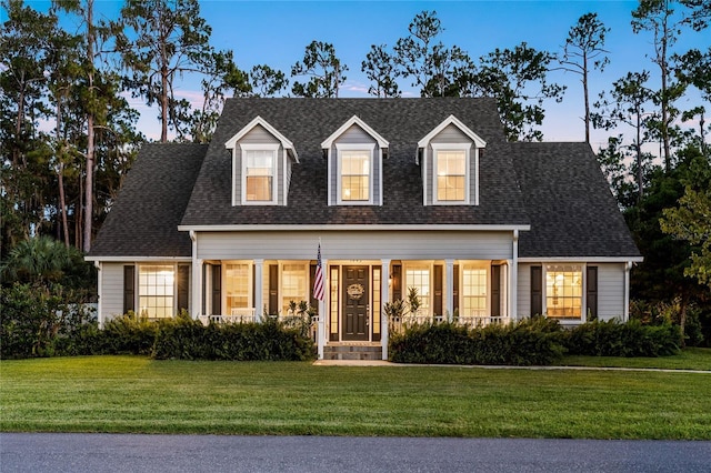 1443 Stone Trl, Enterprise, FL 32725 - cape cod house with a yard and a shingled roof