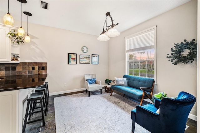 1443 Stone Trl, Enterprise, FL 32725 - sitting room with baseboards
