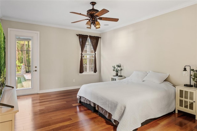 1443 Stone Trl, Enterprise, FL 32725 - bedroom featuring multiple windows, wood finished floors, crown molding, and access to exterior