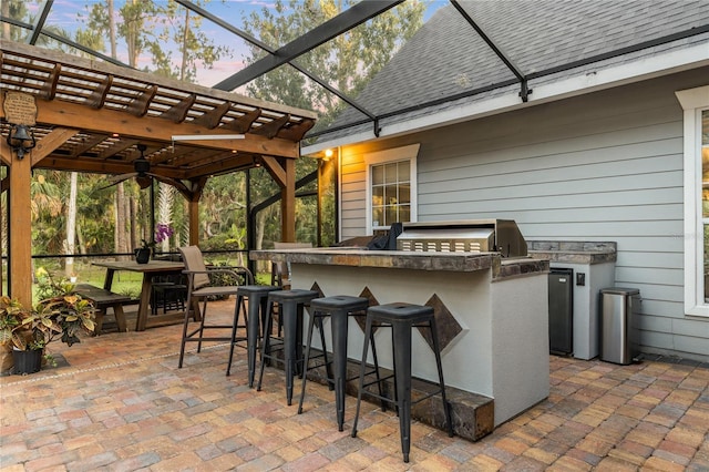 1443 Stone Trl, Enterprise, FL 32725 - view of patio with an outdoor kitchen and a pergola
