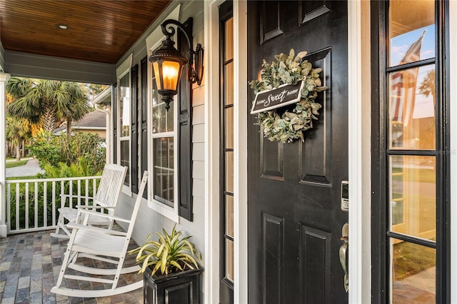 1443 Stone Trl, Enterprise, FL 32725 - view of exterior entry with covered porch