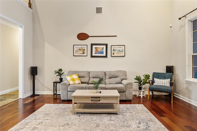 1443 Stone Trl, Enterprise, FL 32725 - living area featuring wood finished floors and a towering ceiling