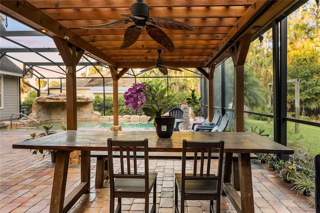 1443 Stone Trl, Enterprise, FL 32725 - wooden terrace featuring a patio, a ceiling fan, an outdoor pool, and a lanai