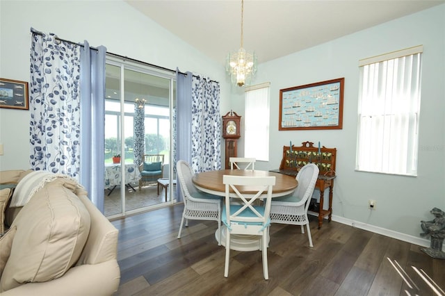 2362 Prairie Dunes, Clermont, FL 34711 - dining space featuring a chandelier, dark wood finished floors, and lofted ceiling