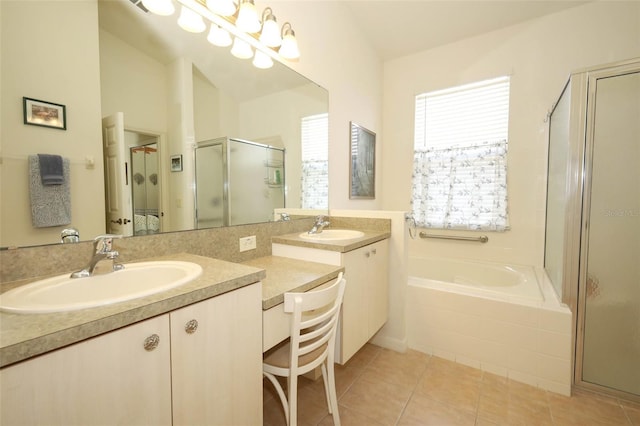 2362 Prairie Dunes, Clermont, FL 34711 - bathroom featuring double vanity, a stall shower, a bath, and tile patterned floors