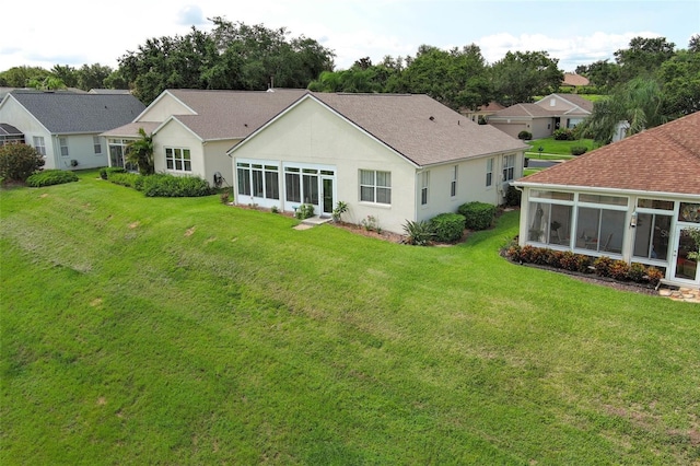 2362 Prairie Dunes, Clermont, FL 34711 - back of house featuring a sunroom and a yard