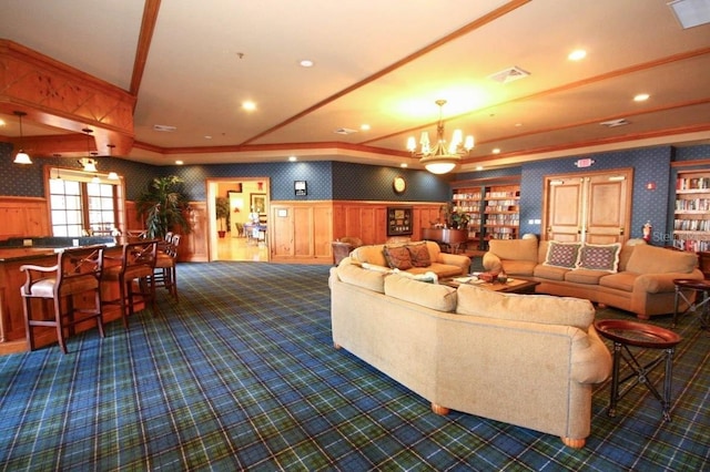 2362 Prairie Dunes, Clermont, FL 34711 - living room featuring wallpapered walls, a chandelier, dark carpet, wainscoting, and recessed lighting