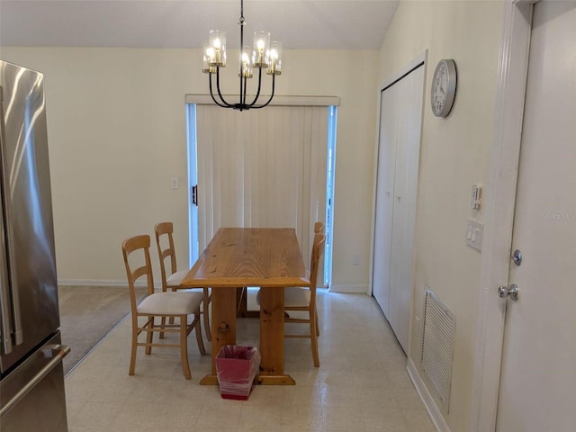 1027 Sheeler Hills Dr, Apopka, FL 32703 - dining area featuring a chandelier and light flooring