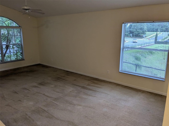 1027 Sheeler Hills Dr, Apopka, FL 32703 - unfurnished room featuring carpet and a ceiling fan