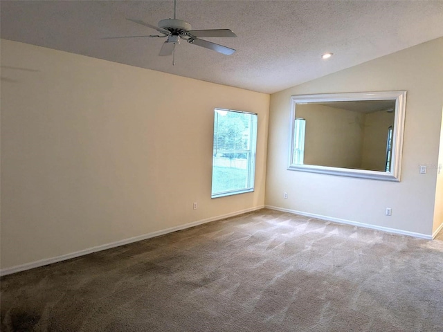 1027 Sheeler Hills Dr, Apopka, FL 32703 - spare room featuring lofted ceiling, carpet flooring, ceiling fan, a textured ceiling, and recessed lighting