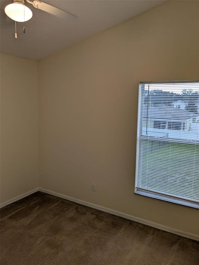 1027 Sheeler Hills Dr, Apopka, FL 32703 - unfurnished room with dark colored carpet and ceiling fan
