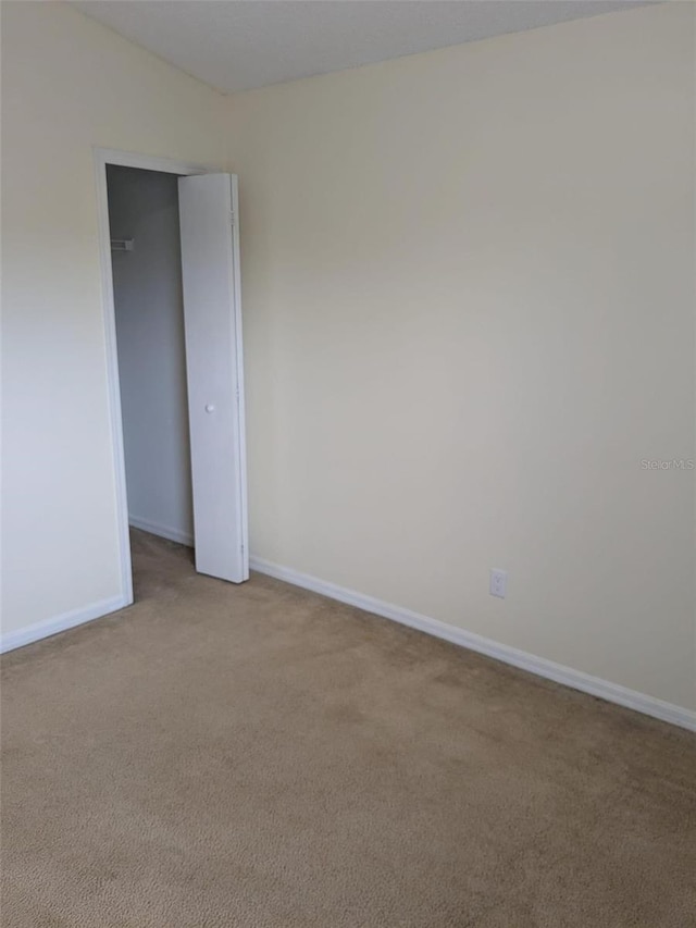 1027 Sheeler Hills Dr, Apopka, FL 32703 - carpeted spare room featuring baseboards