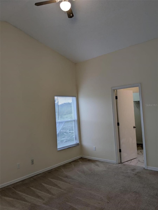 1027 Sheeler Hills Dr, Apopka, FL 32703 - carpeted spare room featuring a ceiling fan and vaulted ceiling