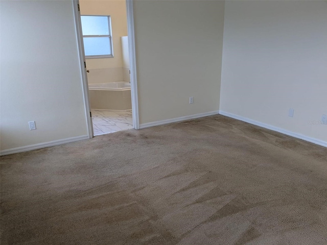 1027 Sheeler Hills Dr, Apopka, FL 32703 - carpeted spare room featuring baseboards