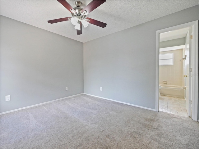 750 Olympic Cir Unit D1, Ocoee, FL 34761 - spare room with carpet flooring, ceiling fan, and a textured ceiling