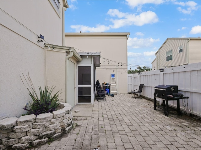 750 Olympic Cir Unit D1, Ocoee, FL 34761 - view of patio / terrace featuring grilling area