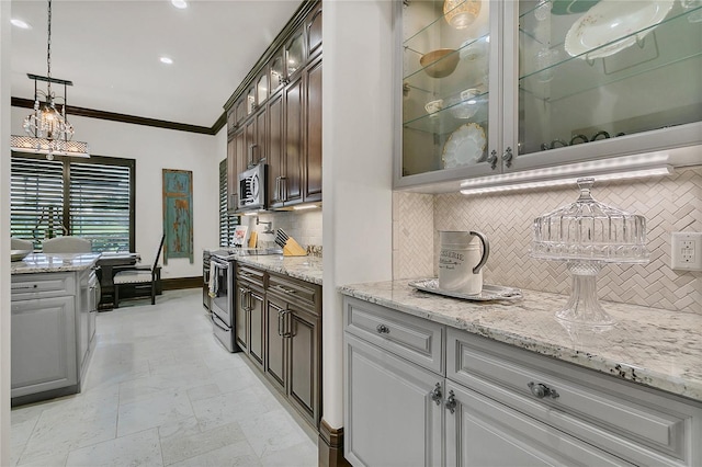 2388 Baronsmede Ct, Winter Garden, FL 34787 - kitchen featuring stainless steel appliances, tasteful backsplash, glass insert cabinets, crown molding, and light stone countertops