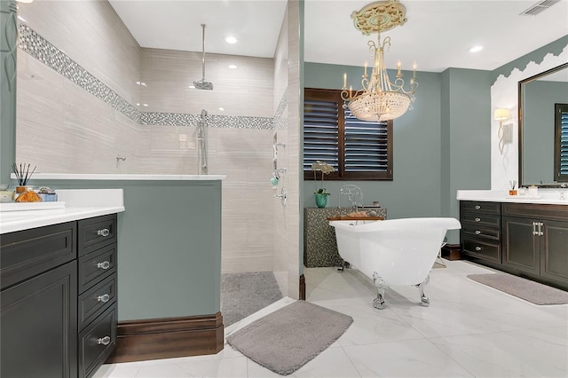 2388 Baronsmede Ct, Winter Garden, FL 34787 - full bath featuring a walk in shower, a freestanding bath, vanity, a chandelier, and recessed lighting