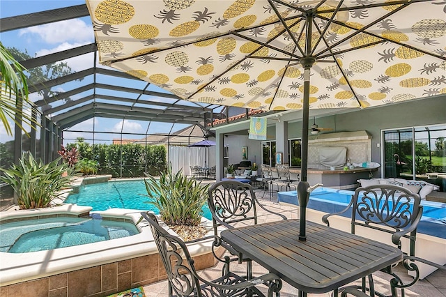 2388 Baronsmede Ct, Winter Garden, FL 34787 - view of swimming pool with a patio area, glass enclosure, and a pool with connected hot tub
