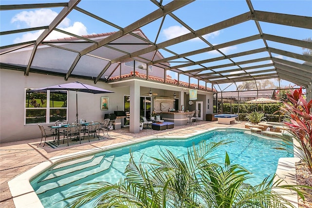 2388 Baronsmede Ct, Winter Garden, FL 34787 - view of pool with a patio area, ceiling fan, an outdoor living space, glass enclosure, and a pool with connected hot tub