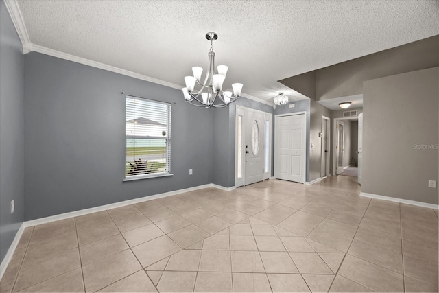 2725 White Magnolia Loop, Clermont, FL 34711 - spare room with a chandelier, a textured ceiling, crown molding, and light tile patterned flooring
