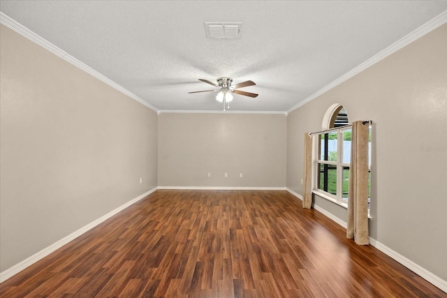 2725 White Magnolia Loop, Clermont, FL 34711 - spare room with ceiling fan, dark wood-style flooring, ornamental molding, and a textured ceiling
