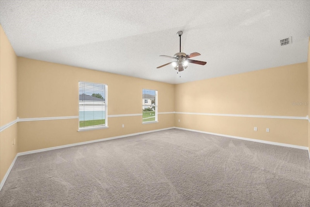2725 White Magnolia Loop, Clermont, FL 34711 - carpeted empty room featuring ceiling fan and a textured ceiling