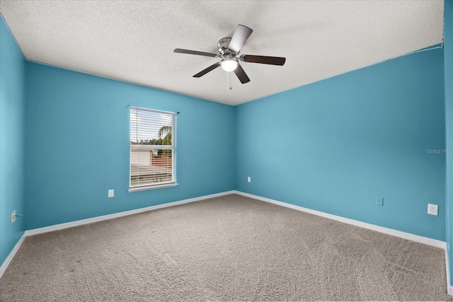 2725 White Magnolia Loop, Clermont, FL 34711 - carpeted spare room with a textured ceiling and a ceiling fan