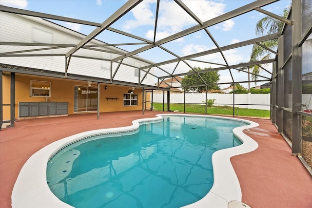 2725 White Magnolia Loop, Clermont, FL 34711 - view of swimming pool with a patio area, glass enclosure, and ceiling fan