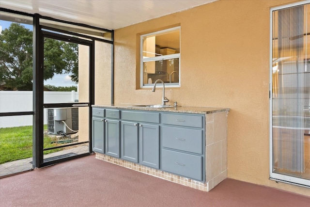 2725 White Magnolia Loop, Clermont, FL 34711 - unfurnished sunroom featuring a sink