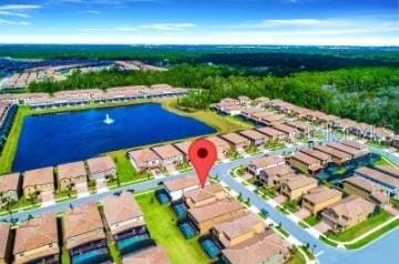 1512 Mumbai Way, Kissimmee, FL 34747 - aerial perspective of suburban area featuring a nearby body of water