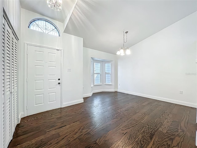 4274 Meeting Pl, Sanford, FL 32773 - foyer featuring a chandelier, dark wood-style flooring, and lofted ceiling