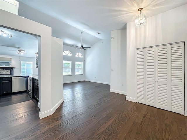4274 Meeting Pl, Sanford, FL 32773 - unfurnished living room with ceiling fan, lofted ceiling, a chandelier, and dark wood-style floors