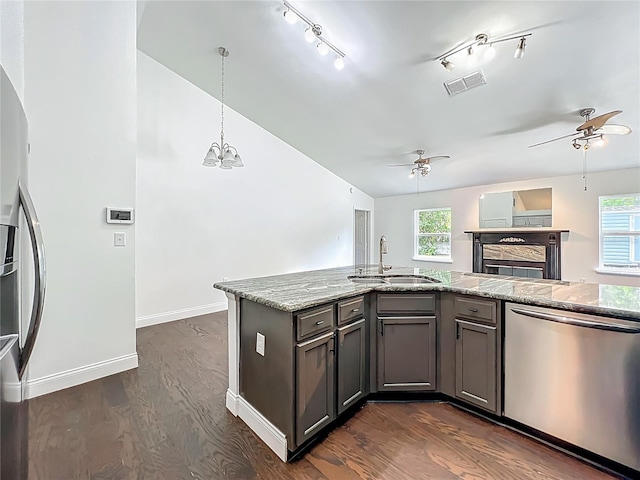4274 Meeting Pl, Sanford, FL 32773 - kitchen with stainless steel appliances, a ceiling fan, healthy amount of natural light, and lofted ceiling