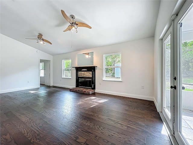 4274 Meeting Pl, Sanford, FL 32773 - unfurnished living room featuring a brick fireplace, dark wood finished floors, lofted ceiling, and ceiling fan