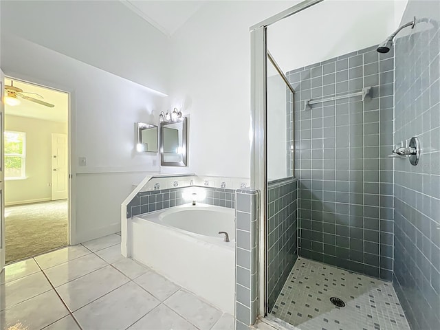 4274 Meeting Pl, Sanford, FL 32773 - full bath with tile patterned flooring, a shower stall, a garden tub, and a ceiling fan