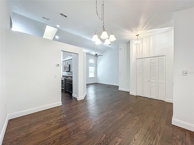 4274 Meeting Pl, Sanford, FL 32773 - spare room featuring lofted ceiling, a chandelier, and dark wood-style floors