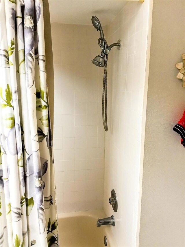 6640 121st Ave Unit 1, Largo, FL 33773 - bathroom view of shower / tub combo