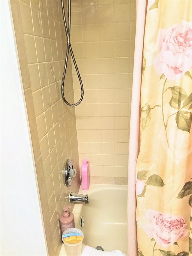 6640 121st Ave Unit 1, Largo, FL 33773 - bathroom with shower / bath combo with shower curtain