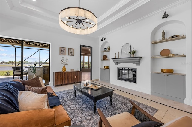 2873 Bellwind Cir, Rockledge, FL 32955 - living room featuring tile patterned flooring, built in shelves, a glass covered fireplace, and ornamental molding