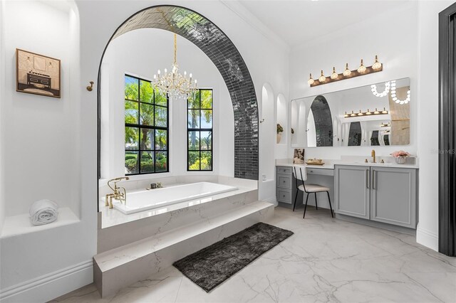 2873 Bellwind Cir, Rockledge, FL 32955 - full bath with vanity, marble finish flooring, a bath, and a chandelier