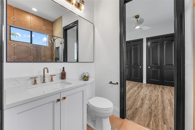 2873 Bellwind Cir, Rockledge, FL 32955 - full bath with vanity, a shower, wood finished floors, and a closet