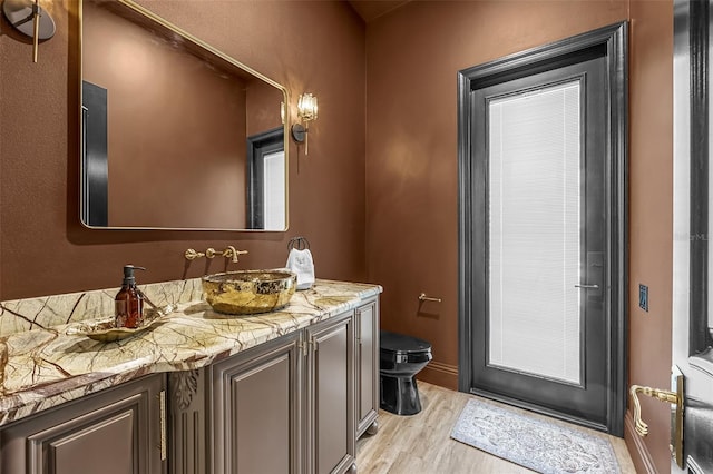 2873 Bellwind Cir, Rockledge, FL 32955 - bathroom featuring wood finished floors and vanity