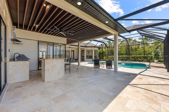 2873 Bellwind Cir, Rockledge, FL 32955 - view of swimming pool featuring a patio area, a lanai, exterior kitchen, and a pool with connected hot tub