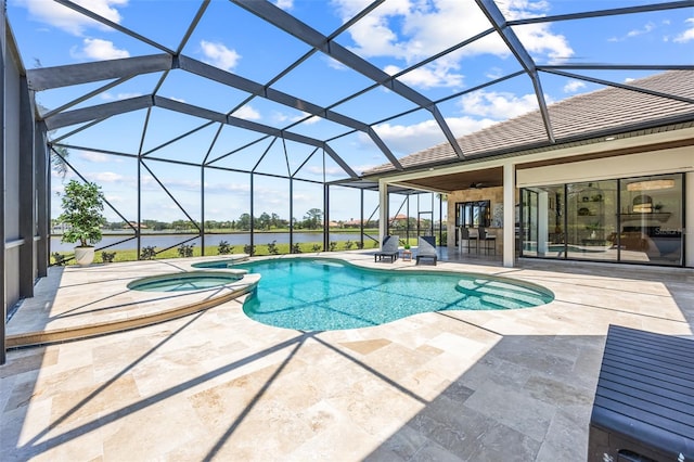2873 Bellwind Cir, Rockledge, FL 32955 - view of pool with a patio, a pool with connected hot tub, a water view, and glass enclosure