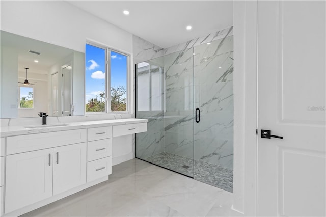 10071 Kingsville Dr, Port Charlotte, FL 33981 - bathroom featuring a marble finish shower, marble look tile flooring, vanity, recessed lighting, and ceiling fan