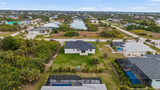 10071 Kingsville Dr, Port Charlotte, FL 33981 - aerial view of residential area featuring a nearby body of water